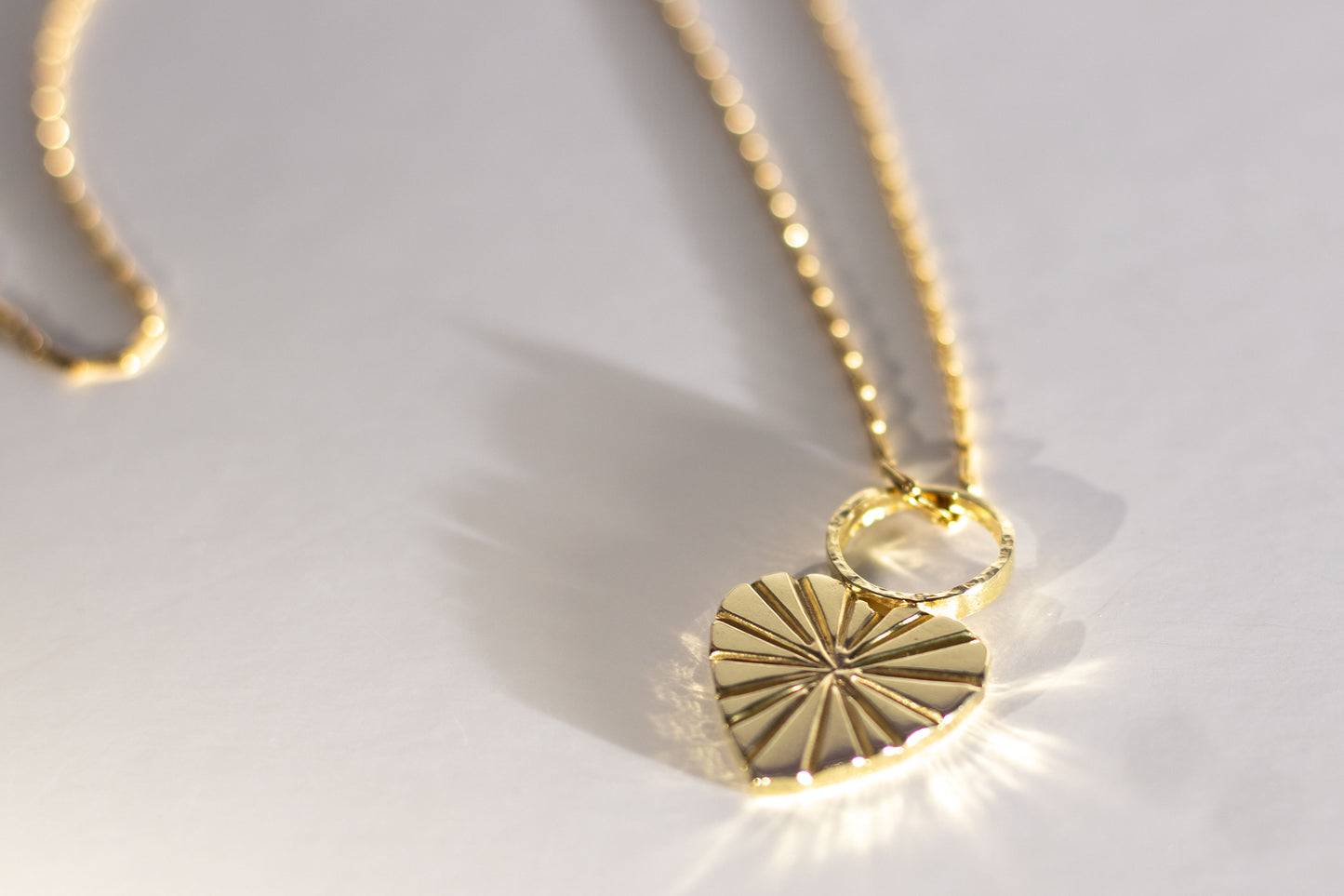 Heart filled with Rays Pendant